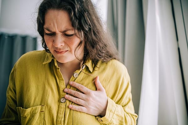 woman with chest pains