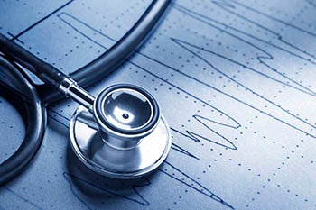 A stethoscope on wood