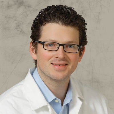 Justin E. Mackey, MD